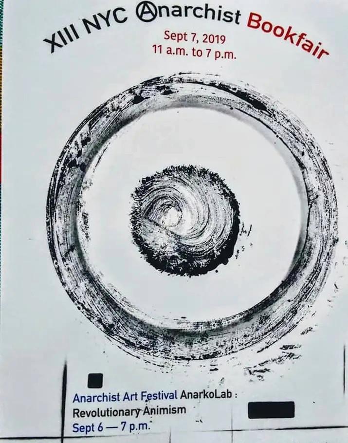(top caption) XIII (A)narchist Bookfair
Sept 7, 2019
11 a.m. to 7 p.m.

The image is a paintbrush made circle, with a smaller solid circle in the center, also made by paintbrush.
