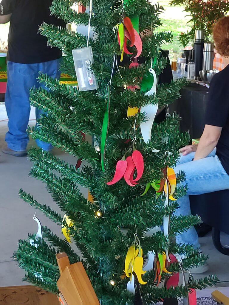 Xmas tree with ornaments that look like Pepper, and also some bystanders.